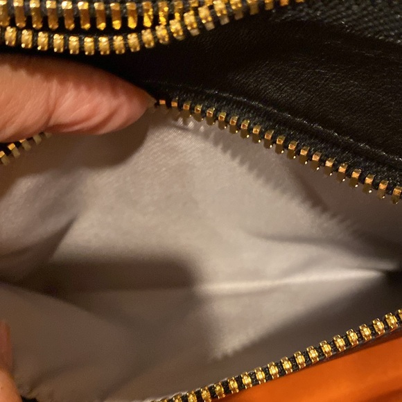 Tumi crossbody bag.
Length is 8.5 inches 
Height is 5.5 inches - Picture 11 of 15